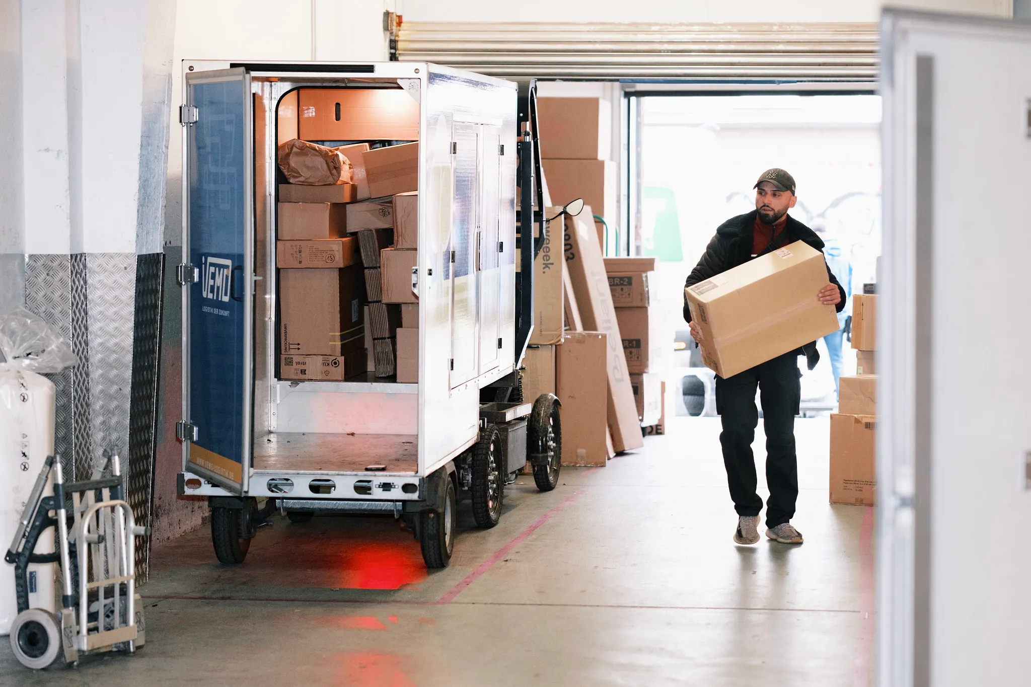 Parcel carrier loads trailer