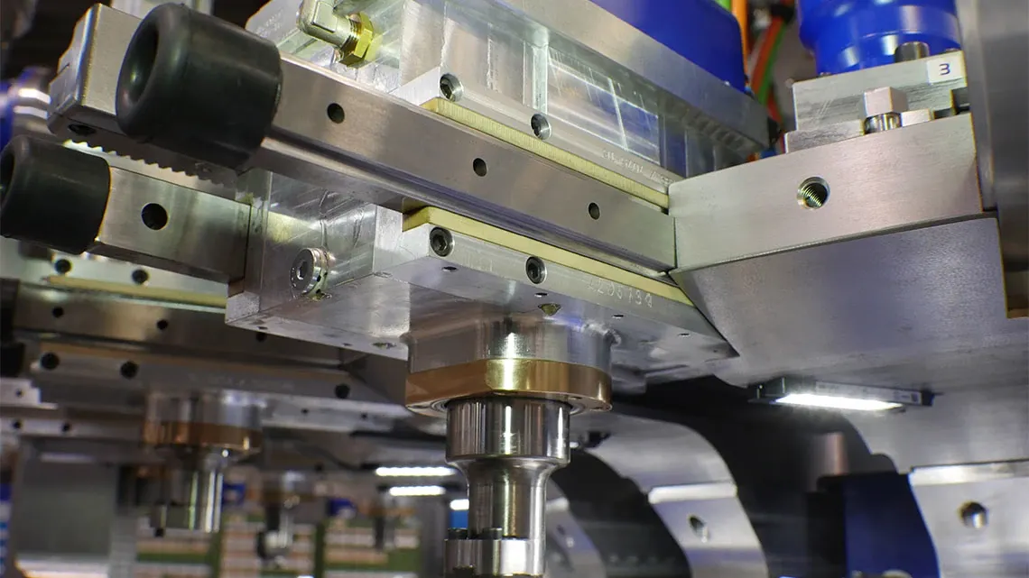 Rotary transfer machine with press