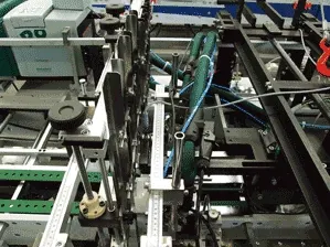 Folding and gluing machine