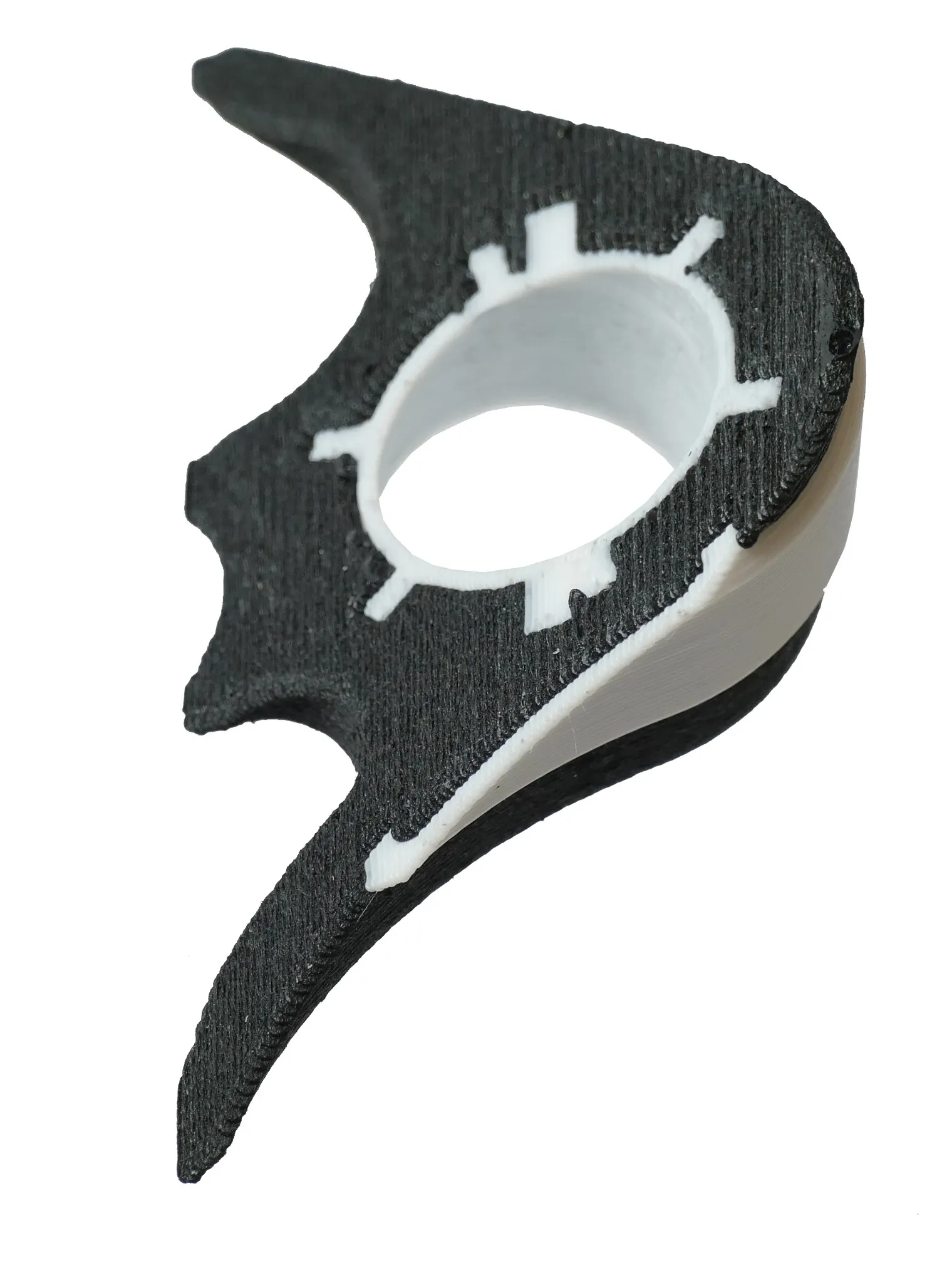 Pièce à deux composants