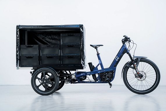 Sepeda elektronik kargo "Escape" GLEAM dengan kotak transportasi di area kargo (Sumber: GLEAM)
