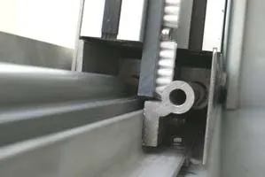 Protective door adjustment in a car wash