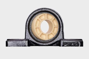 Spherical insert bearing with pillow block bearing with cast iron housing