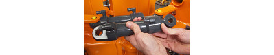 Polymer plain bearings in the various hinges, locks and hydraulic cylinders of the root ball transplanter.