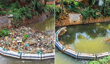 Plastikmüll in einer Auffangvorrichtung im Fluss und gereinigt