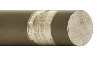 Welle mit deutlich sichtbarer Abnutzung durch ein Metallgleitlager