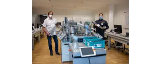 Presenting the axes to Carl-Reuther-Berufskolleg in Hennef, Germany