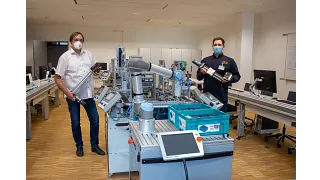 Presenting the axes to Carl-Reuther-Berufskolleg in Hennef, Germany