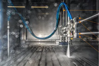 Actuador lineal eléctrico de igus en un sistema de limpieza con agua a presión