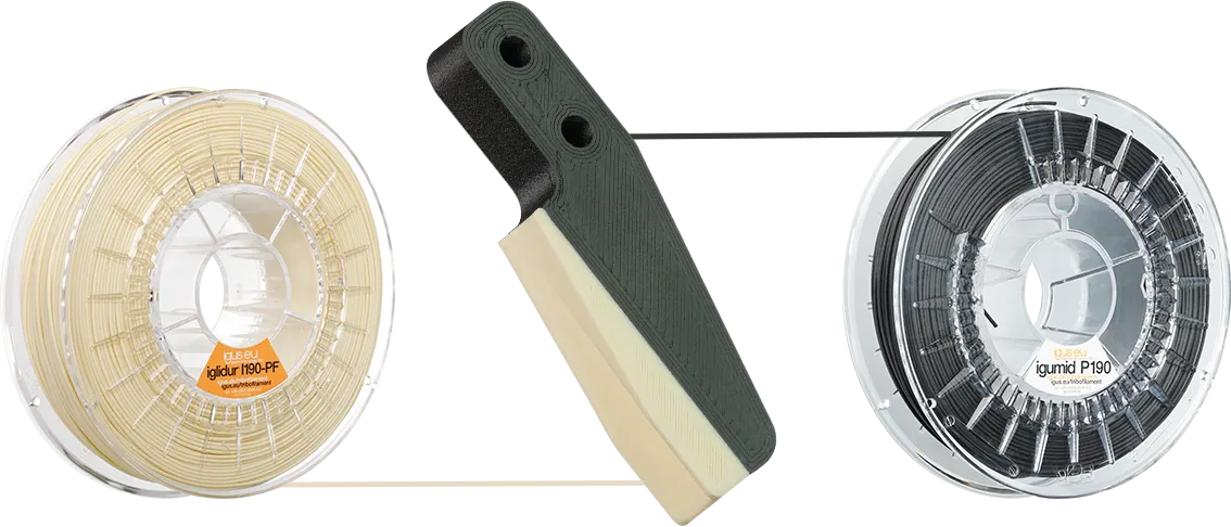 Na impressão multimaterial, dois ou mais materiais podem ser combinados num componente num único processo de impressão. Aqui, uma pinça feita com os materiais parceiros iglidur i190 e igumid P190.