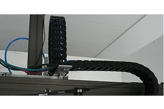 energy chain supplying energy to the moving axes