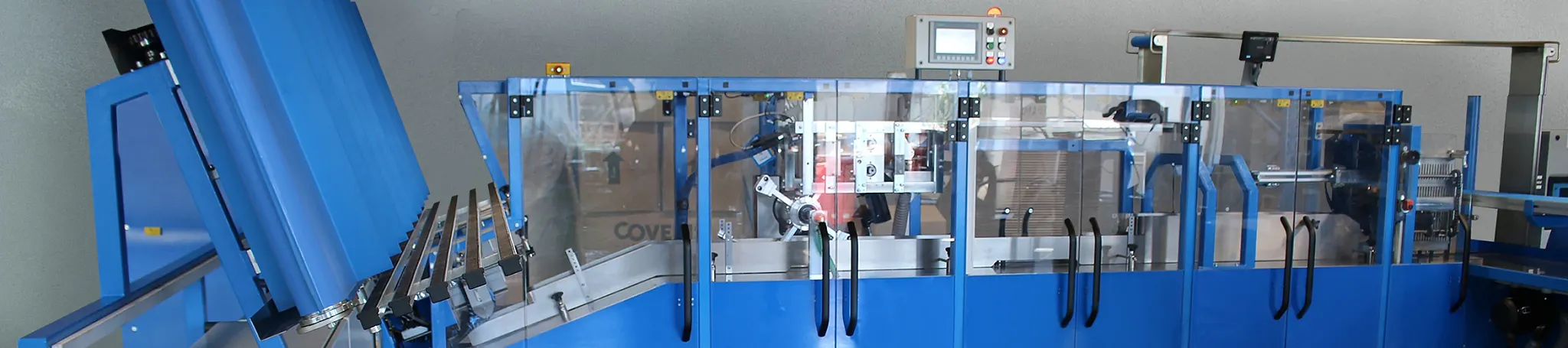 Absorbent pad insertion machine LAD tray inserter