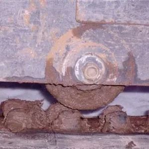 Excavateur avec bagues en plastique