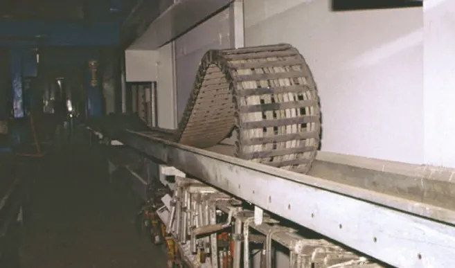 Energy chains replace trailing cables on bridge crane in concrete plant ...