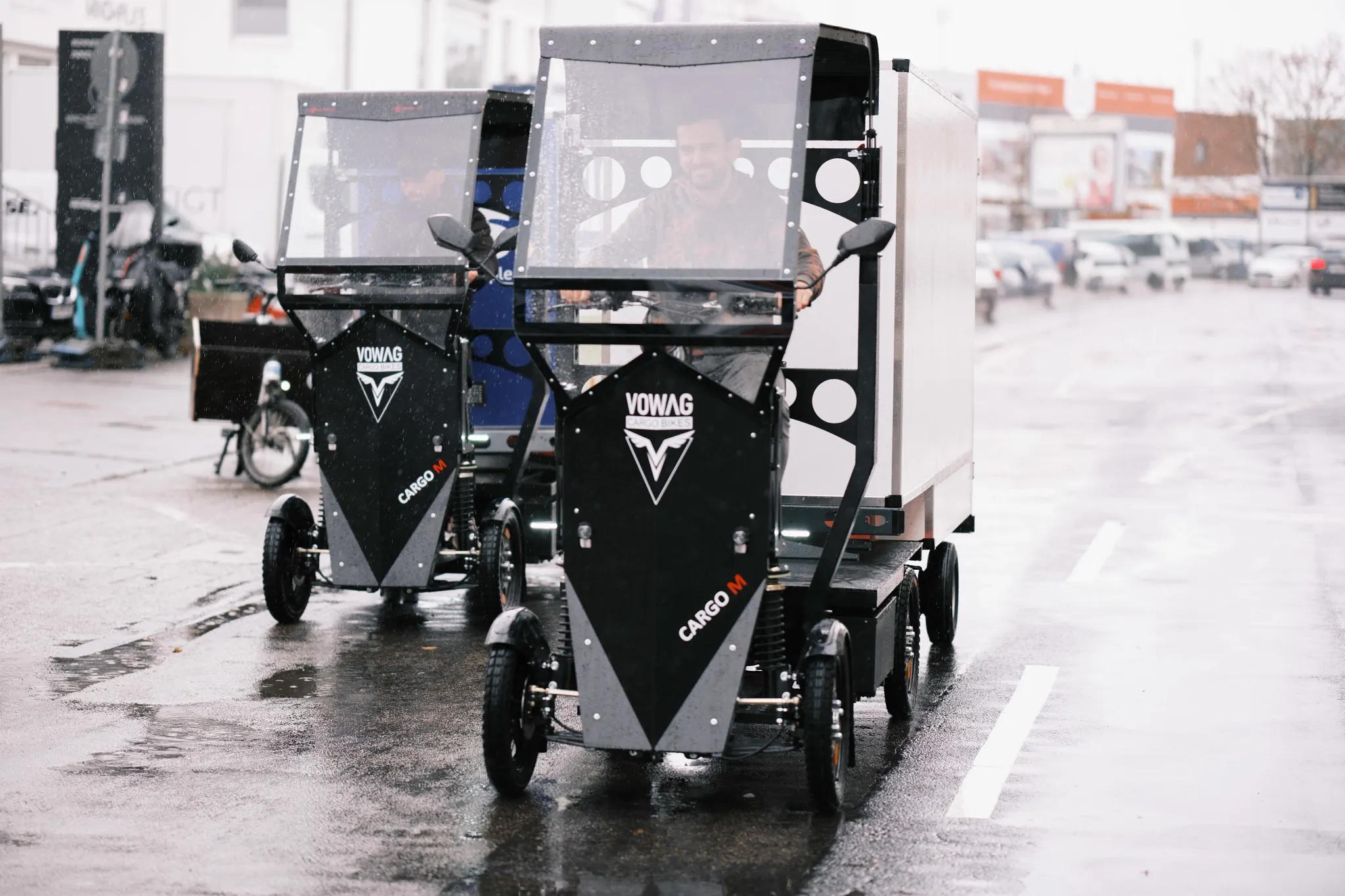 Two cargo bikes next to each other