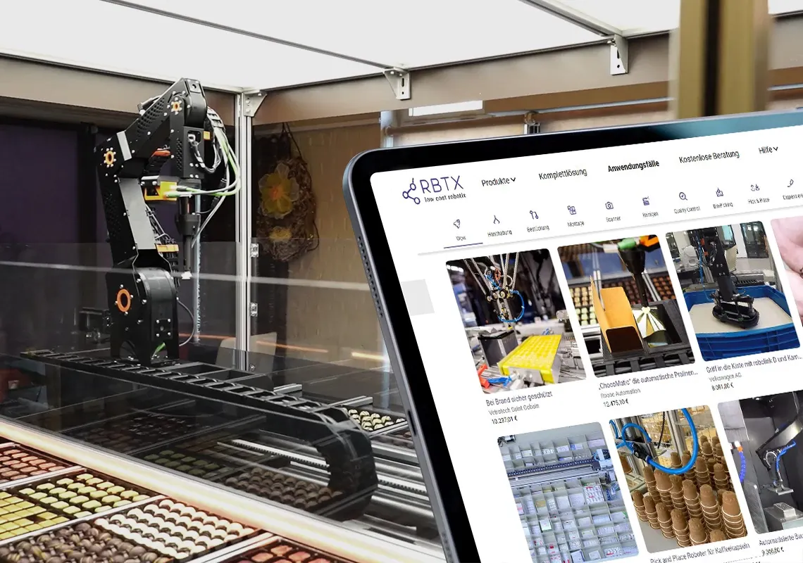 Laptop with robot in background