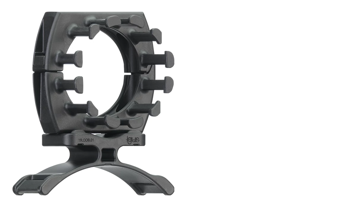 élément de fixation et serre-câbles