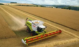 CLAAS combine harvesters in action in the field