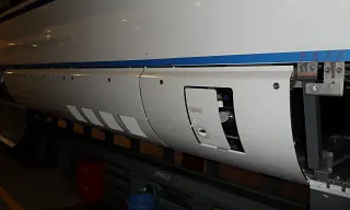 Portas de correr leves com componentes igus