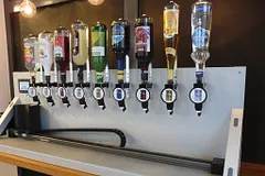 Lubrication-free linear axis for automated cocktail mixer