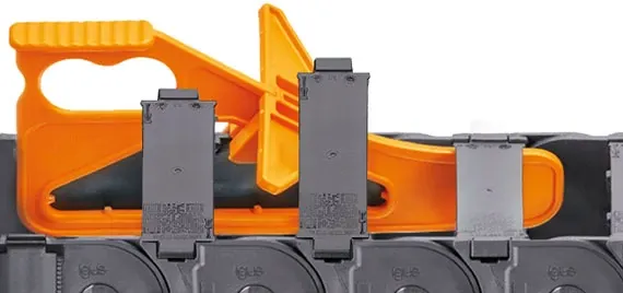 Dispositivo de abertura das calhas articuladas