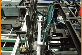 Machine à plier et à coller