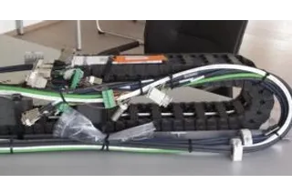 Pre-harnessed energy supply systems dramatically reduce throughput and assembly times.