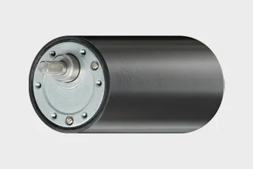 DC motor with spur gear and protecting housing