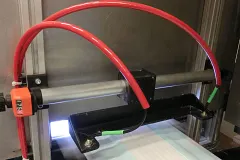 Single-tube linear axes in nappy production plants