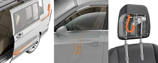 Energieketten in der Schiebetür, am Fensterheber und in der Kopfstütze eines Autos