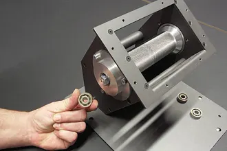 Mechanical drive unit of a pellet stove