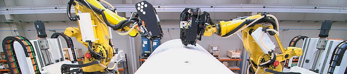 Pružné 3D energetické řetězy jako vedení kabelů pro nýtovací roboty pro stavbu letadel