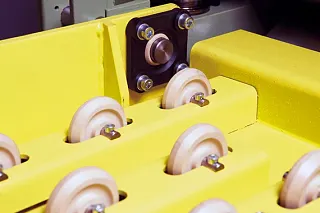 The igubal  flange mounted bearings with mounting holes, wear-resistant and insensitive iglidur rollers for conveyor belt transport.