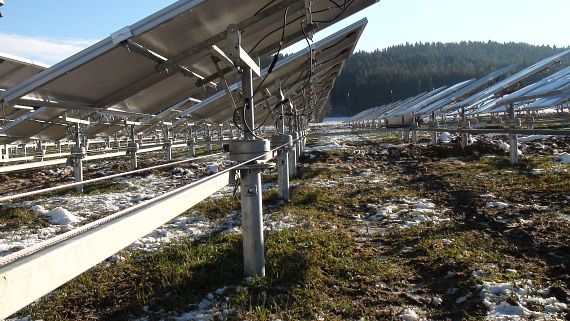 Photovoltaic system with tracking system on house roof.