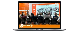 Laptop showing presentation on Truckstop conference 2026