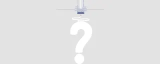 Ein Fragezeichen wird aus einem 3D-Druck Filament gedruckt.