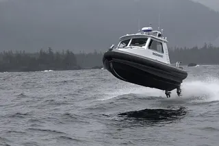 Boat with shock absorbing seats